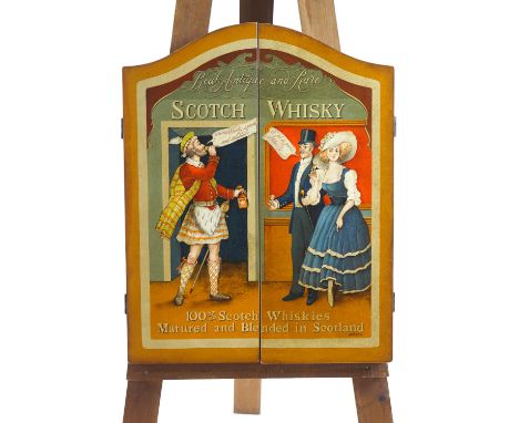 A rare Scotch Whisky dart board, new and boxed, complete with surround and darts, 64cm high