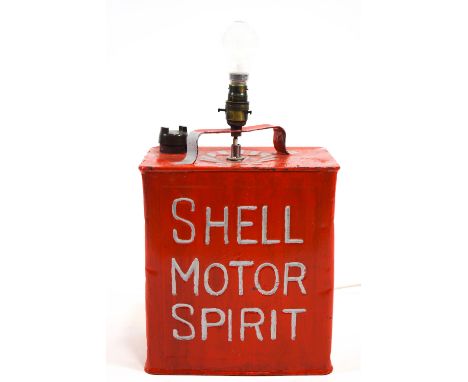 A Shell motor spirit oil can, of rectangular section, adapted as a lamp base, enriched in red enamel, 32cm high (ex fittings)