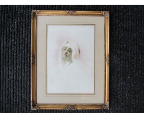 A gilt framed and glazed pencil and watercolour portrait of a nun.  Indistinct faint signature bottom left.  Printed on mount
