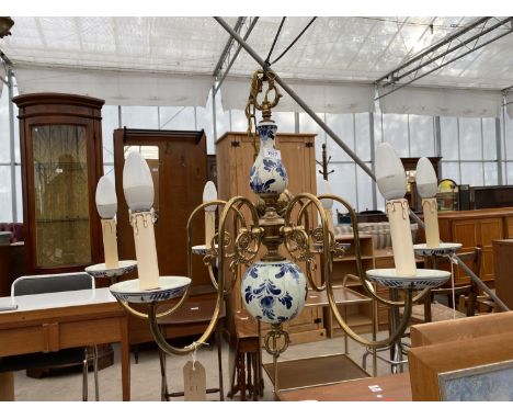 A BRASS AND CERAMIC SIX BRANCH CHANDELIER STYLE LIGHT FITTING 