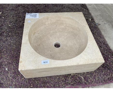 A CREAM SOLID MARBLE WASH BASIN 