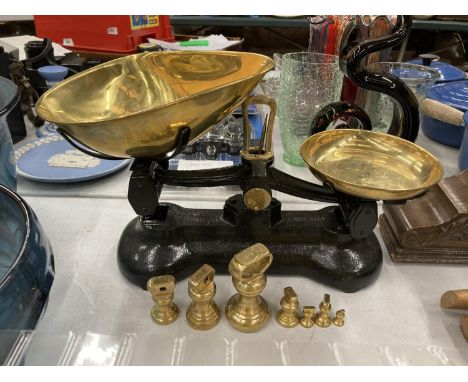A SET OF VINTAGE LIBRA CAST AND BRASS SCALES WITH WEIGHTS 