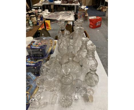 A QUANTITY OF VINTAGE DECANTERS PLUS AN AMOUNT OF DECANTER STOPPERS 