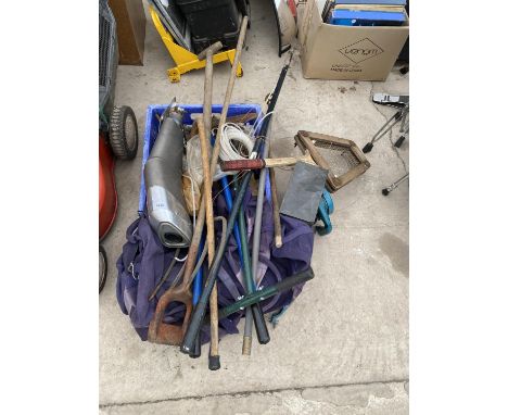 AN ASSORTMENT OF TOOLS TO INCLUDE AN EXHUAST PIPE, SHEARS AND A TENNIS RACKET ETC 