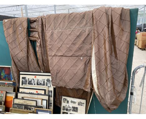 A LARGE PAIR OF BROWN CURTAINS 