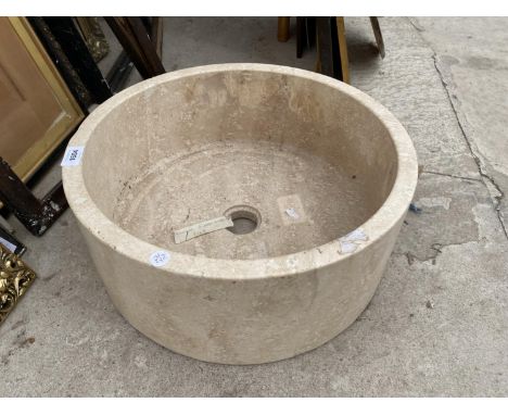 A CREAM SOLID MARBLE WASH BASIN 