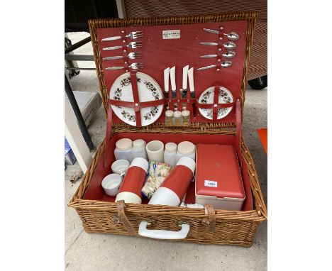 A RETRO WICKER PICNIC HAMPER COMPLETE WITH PICNIC SET 