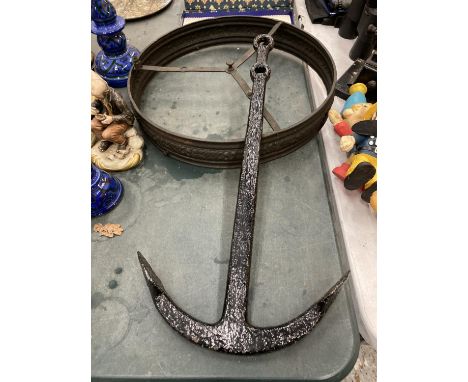 A VINTAGE CAST ANCHOR LENGTH 62CM AND AN EMBOSSED METALWARE CENTRE CEILING LIGHT HOLDER 