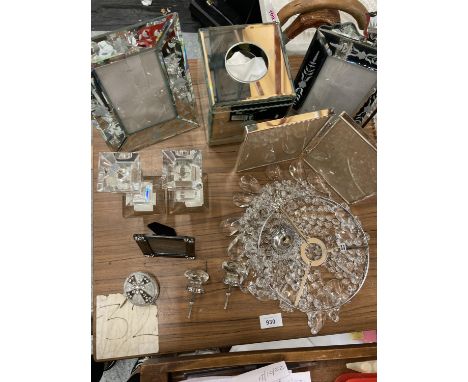 A QUANTITY OF GLASSWARE ITEMS TO INCLUDE CANDLESTICKS, PHOTO FRAMES, A CRYSTAL DROP LIGHT SHADE, ETC 