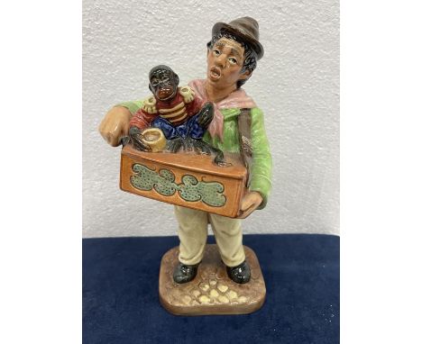 A ROYAL DOULTON FIGURE THE ORGAN GRINDER HN 2173 
