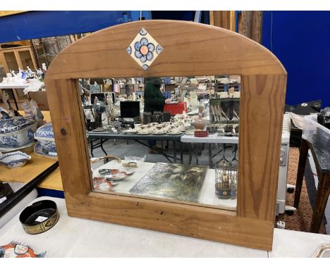 A PINE FRAMED MIRROR WITH TILE INSERT DECORATION 69CM X 63CM 