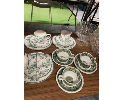 THREE ADAMS IRONSTONE VINTAGE CUPS AND SAUCERS TOGETHER WITH AN IVORY AND CREAM AND GREEN IVORY PATTERN PART TEASET 