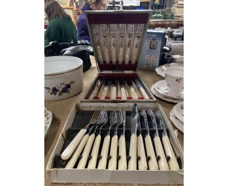 A VINTAGE BOXED KNIFE AND FORK SET WITH MOTHER OF PEARL HANDLES PLUS A SET OF FISH KNIVES AND FORKS 