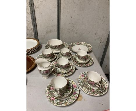 A CROWN STAFFORDSHIRE FLORAL TEASET TO INCLUDE CUPS, SAUCERS, CREAM JUG, SIDE PLATES, SUGAR BOWL, ETC 