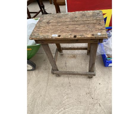 A VINTAGE SCRATCH BUILT WORK BENCH 