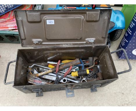 AN AMMO TIN CONTAINING TOOLS TO INCLUDE SPANNERS AND A HAMMER ETC 