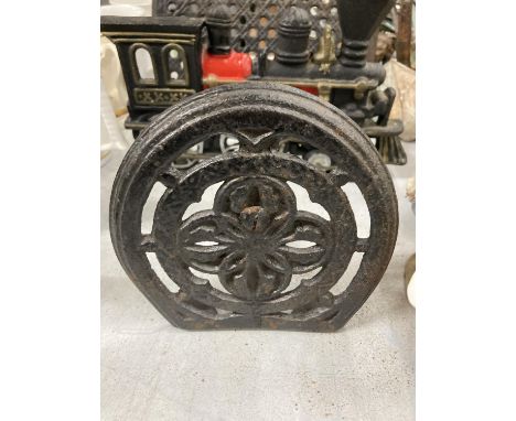 THREE CAST DOORSTOPS TO INCLUDE A STEAM ENGINE, ETC 