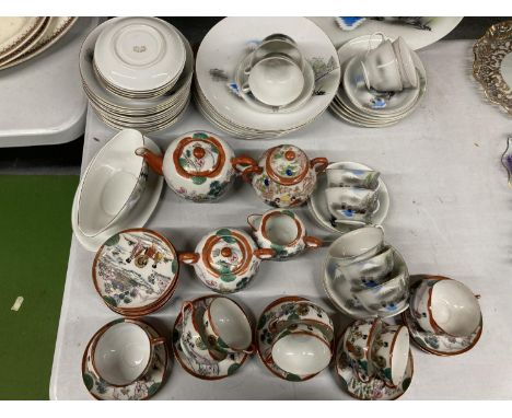 AN ORIENTAL DINNER SERVICE TO INCLUDE PLATES, SAUCE BOAT, CUPS, SAUCERS, ETC PLUS AN ORIENTAL TEASET INCLUDING TEAPOT, CUPS, 