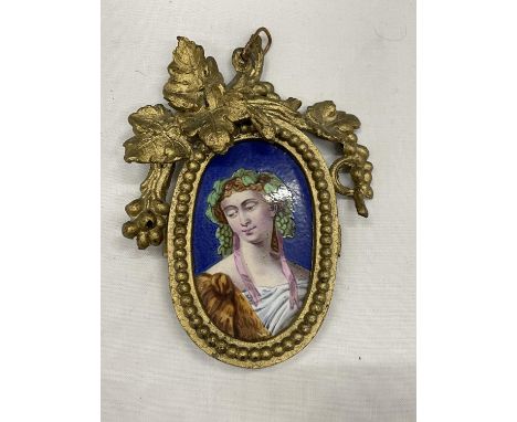 A VINTAGE BRASS FRAMED MINATURE ENAMEL PORTRAIT 