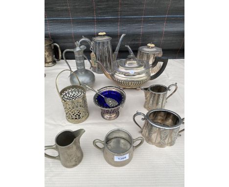 AN ASSORTMENT OF SILVERPLATE ITEMS TO INCLUDE A TEAPOT, AN URN AND MILK JUGS ETC 