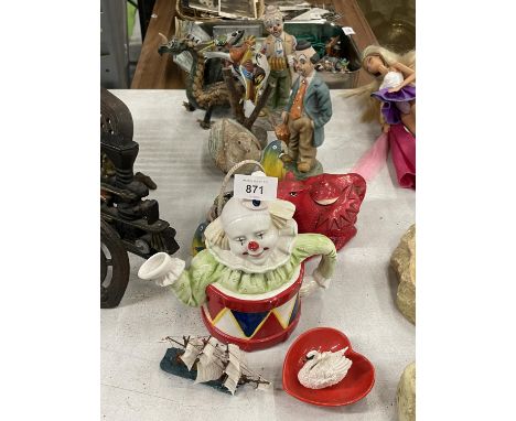 A QUANTITY OF ITEMS TO INCLUDE A CLOWN AND DRAGON TEAPOT, CLOWNS, PARROTS, CHICKENS, A DRAGON, ETC 