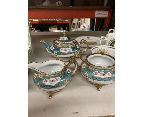 A NORITAKE TEAPOT, CREAM JUG AND SUGAR BOWL WITH TURQUOISE, FLORAL AND GILT DECORATION - TEAPOT LID HAS BEEN GLUED BACK TOGET