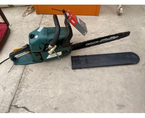A PETROL OREGON CHAINSAW WITH A SPARE CHAIN 