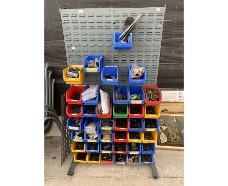 A WORKSHOP DISPLAY BOARD WITH A LARGE ASSORTMENT OF LIN BINS CONTAINING HARDWARE AND TOOLS ETC 