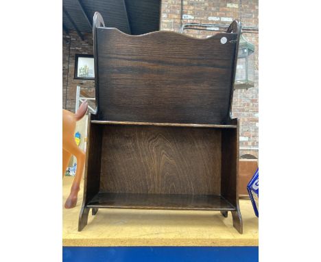 A VINTAGE MAHOGANY MAGAZINE RACK AND BOOKSHELF 