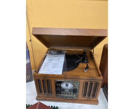 A RECORD DECK, CD PLAYER AND RADIO HOUSED IN A VINTAGE STYLE BOX 