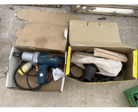 A BOSCH ELECTRIC DRILL AND A BOSCH ELECTRIC SANDER 