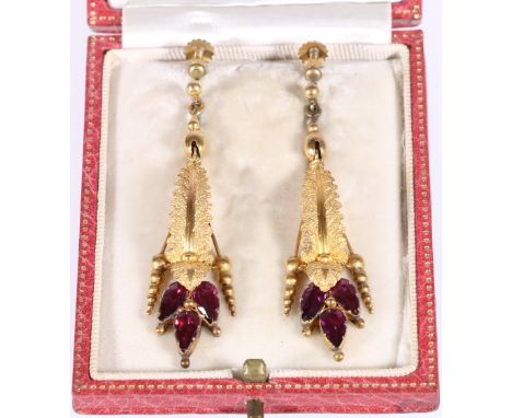 Pair of Victorian gold drop earrings of leaf form, each with three almondine garnets. CONDITION REPORT: It is unmarked but tr