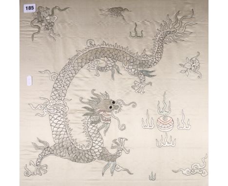Early 20th century Chinese embroidered panel of square shape depicting a dragon confronting a flaming pearl, 47cm x 50cm