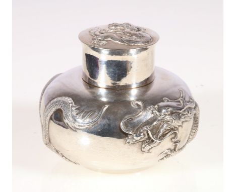 Wang Hing silver tea caddy of squat spherical form, the lid and body decorated in relief with encircling dragon, WH, silver a