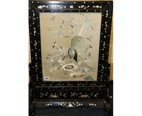 Early 20th century Chinese screen, the central embroidered panel depicting birds amongst flowering branches, the frame and su