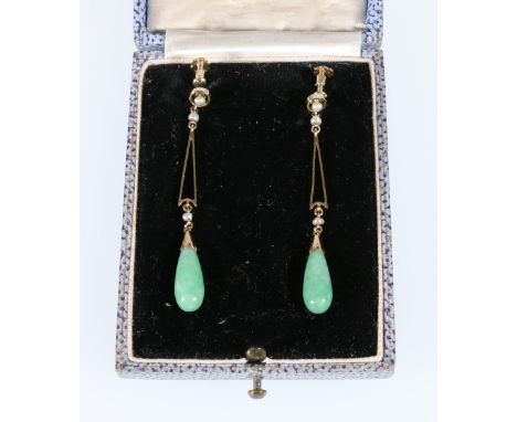 Pair of jade drop earrings, each dependant from tapered openwork and pearl collet. CONDITION REPORT: 4.6g
