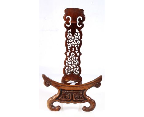 Chinese hardwood plate stand with scroll supports and pierced back, 31cm x 18cm and a pair of cup and bowl stands. (3) CONDIT