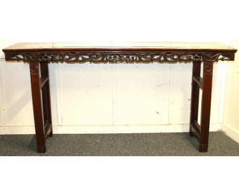 Early 20th century Chinese padouk wood altar table with pierced and carved apron of peach and scroll design on straight end s