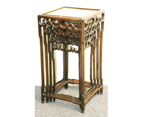 Chinese nest of four tables of square shape with pierced and carved scroll apron on faux bamboo supports, largest 37cm square