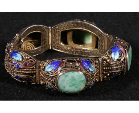 Chinese early 20th century silver gilt bracelet, the five wirework domed sections with relief and enamelled scrolling floral 
