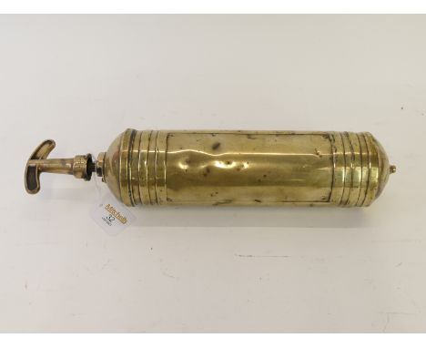 A vintage brass fire extinguisher, 38cm length 