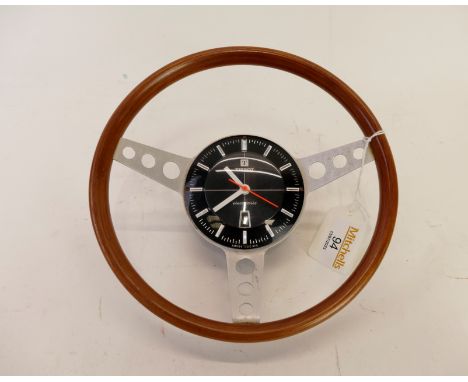 Tissot electronic wheel clock