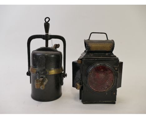 Dependents Type No. 540 railway lantern by J.R. Oldfield Ltd. and a Premier Crestella lamp