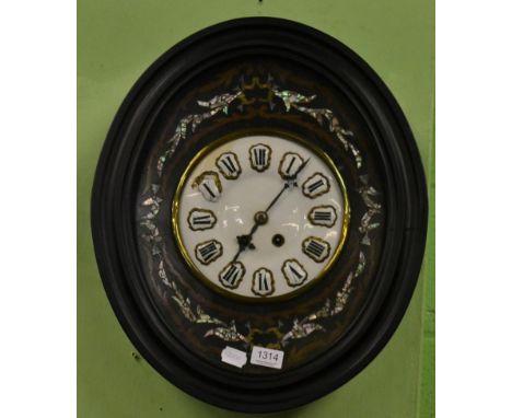 A mid 19th century French papier mache and mother of pearl oval wall clock, white enamel Roman dial, two train movement, ebon