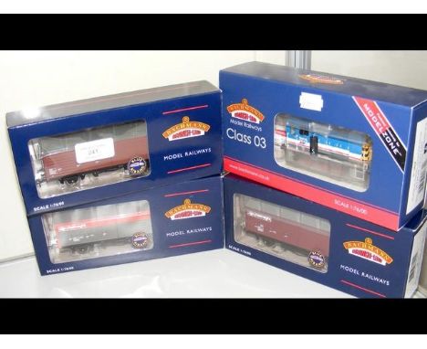 A boxed Bachmann Diesel Shunter, together with three boxed rolling stock 