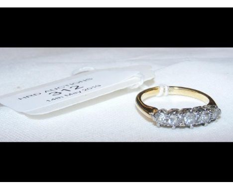 An 18ct gold five stone diamond ring 