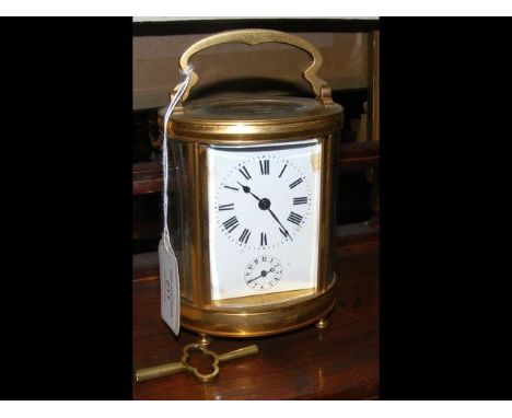 A 12cm high brass cased carriage clock 