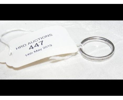 A platinum and diamond ring CONDITION REPORTSize N