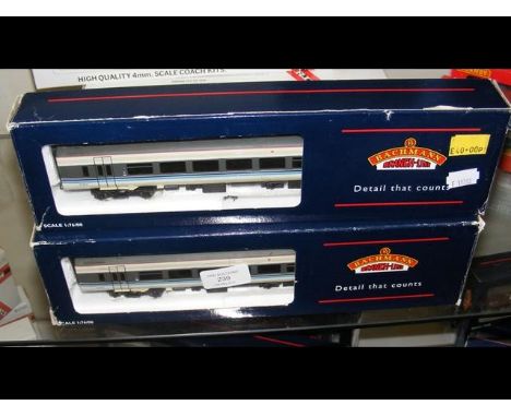 A boxed Bachmann carriage and one other 