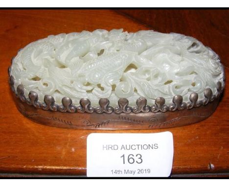 A Chinese white metal and jade paperweight - 11cm long CONDITION REPORTSee further images; one lappet missing to white metal 